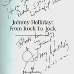 BOOK JOHNNY HOLLIDAY INSCRIBED TO DENNIS CHANDLER