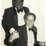 WEB FLEMING DENNIS CHANDLER SEATED AT PIANO BLK WH TUXES